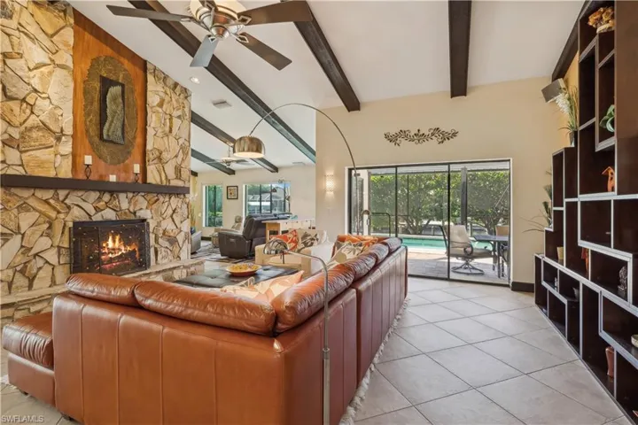 Stone Fireplace - propane powered. Living Area opens to lanai