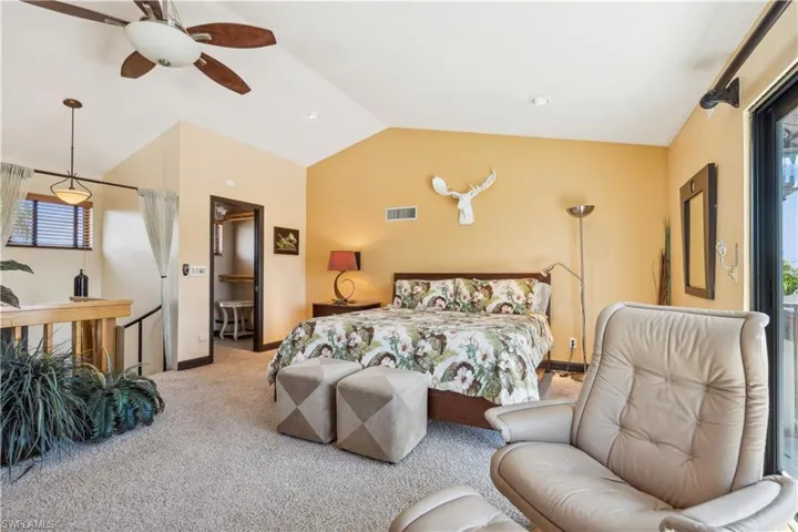 Second Floor Master Suite Carpeted - featuring vaulted ceiling and ceiling fan