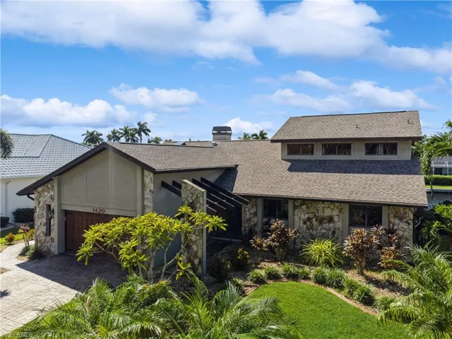 1420 SW 53rd Terrace - Lush Landscaping - Stamped Concrete Drive