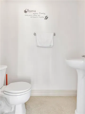 Bathroom with toilet and sink