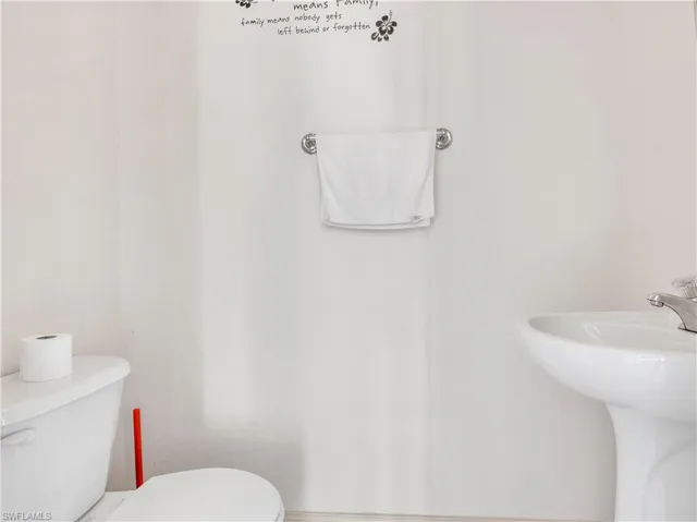 Bathroom featuring toilet and sink