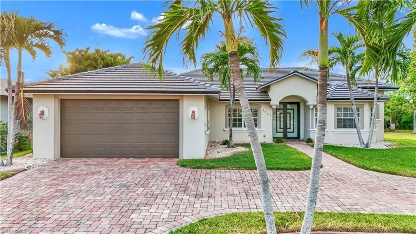 Single story home with a garage