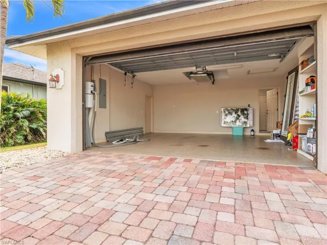 Garage featuring electric panel