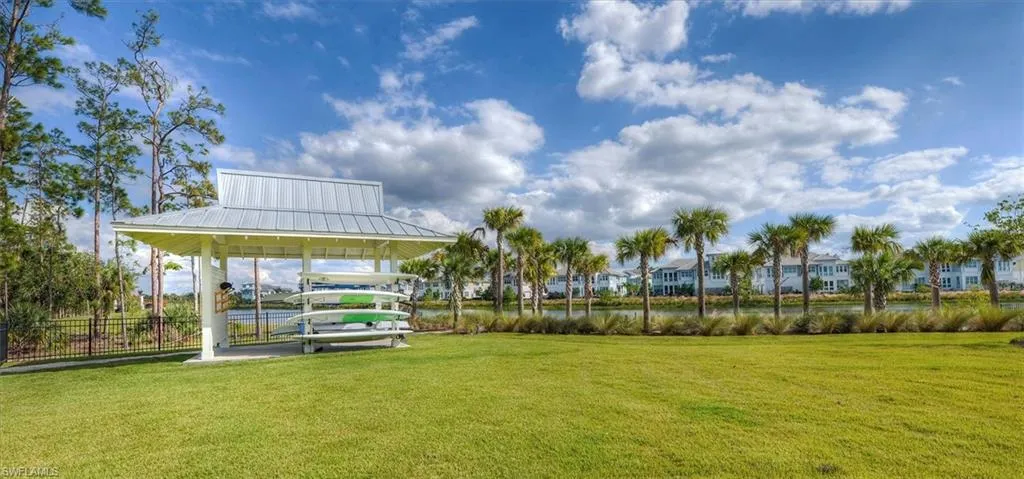 View of home's community featuring a water view and a gazebo