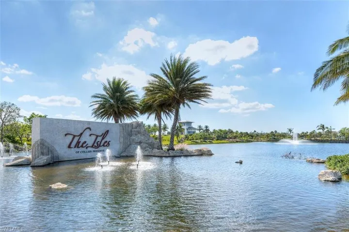 Community sign with a water view