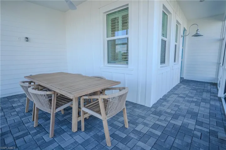 View of patio with outdoor dining area
