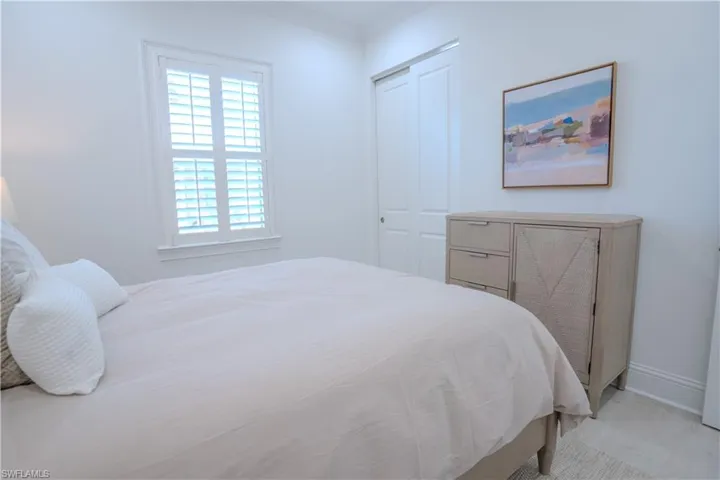 Bedroom featuring a closet and ornamental molding