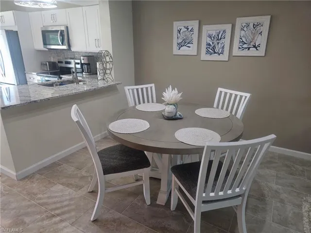 Dining space featuring baseboards