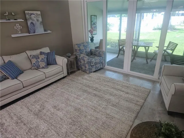 Living room with tile patterned floors