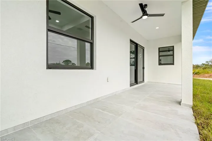 View of patio with ceiling fan