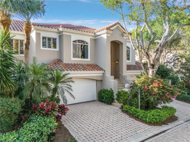 Mediterranean / Spanish Villa with a 2 car garage