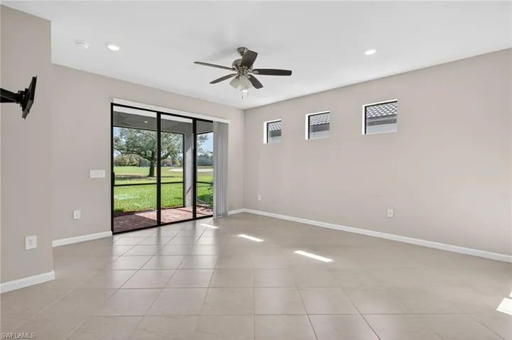 Unfurnished Living Room featuring ceiling fan, recessed lighting, and light tile patterned floors