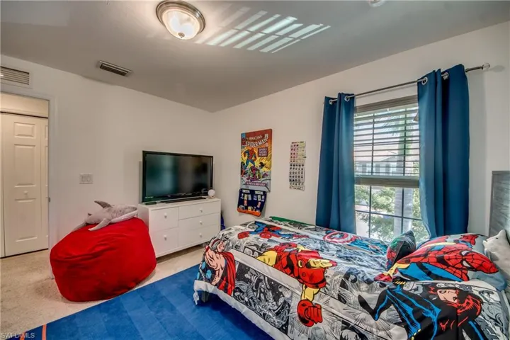 Bedroom featuring carpet flooring