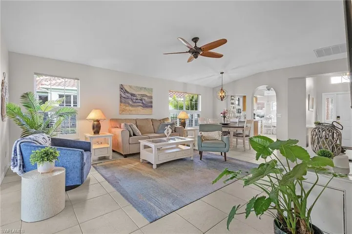 Living room featuring ceiling fan