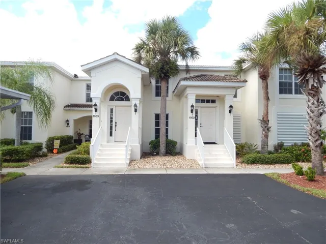 View of mediterranean / spanish-style home front of unit