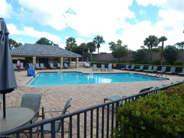 View of 2nd swimming pool with a patio