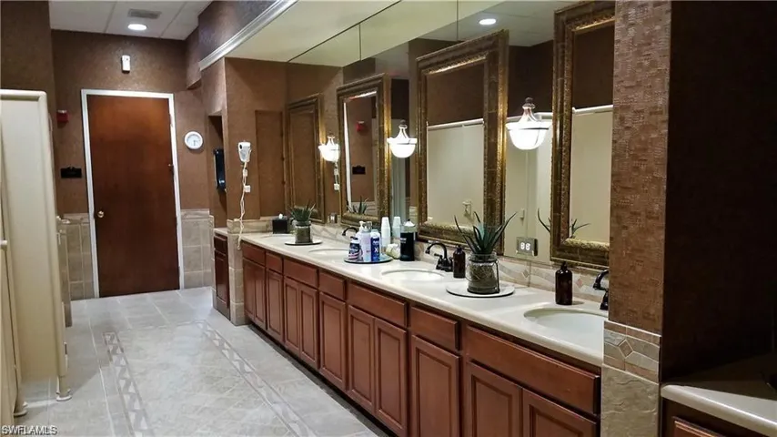 Bathroom with vanity and tile patterned floors