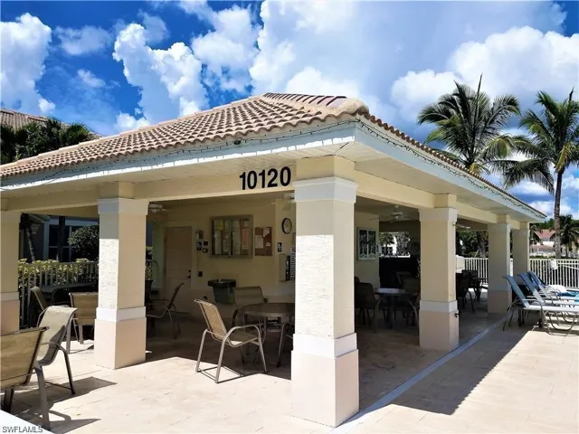 Rear view of property featuring a patio area