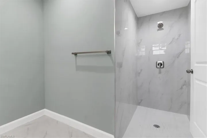 Bathroom with a tile shower