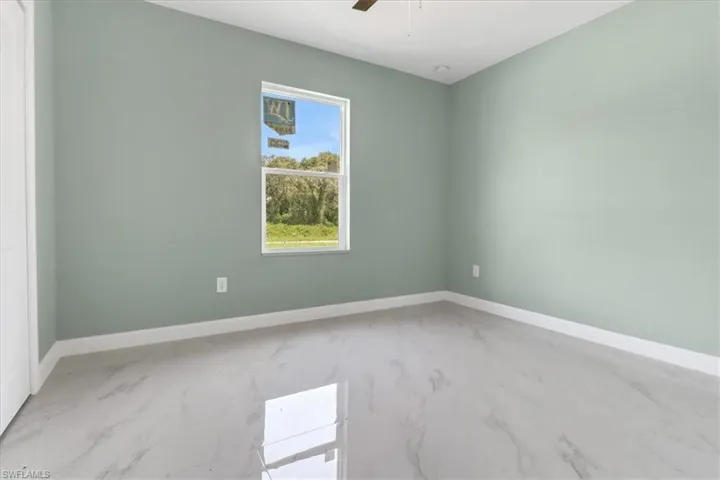 Spare room featuring ceiling fan