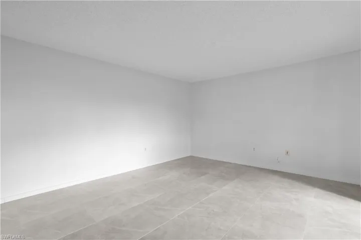 Spare room with a textured ceiling