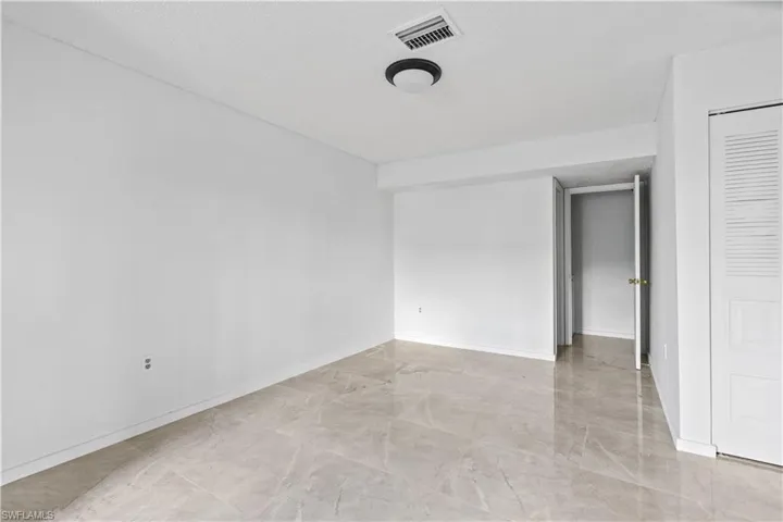 Spare room with a textured ceiling
