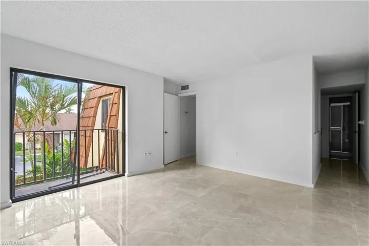 Spare room with a textured ceiling