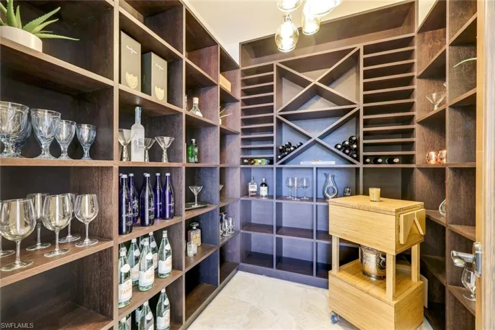 Wine area with tile patterned flooring