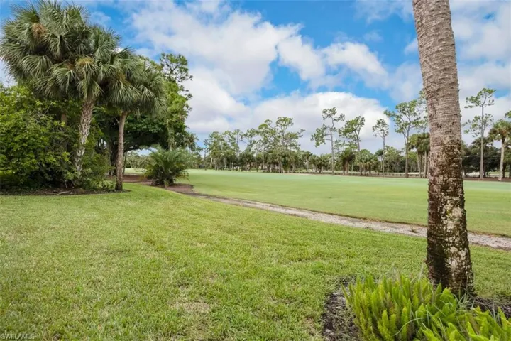 View of #16 FAIRWAY with view of scattered trees and golf course view
