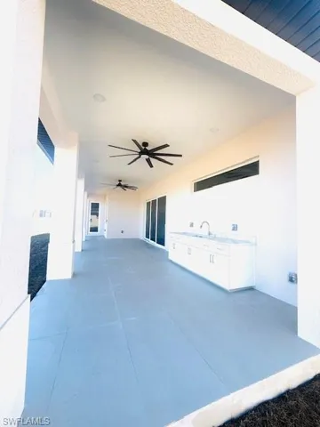 View of patio / terrace with ceiling fan