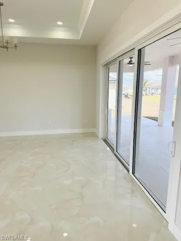 View of patio with a ceiling fan
