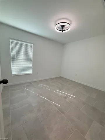 Spare room with baseboards