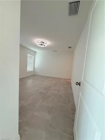 Spare room with baseboards
