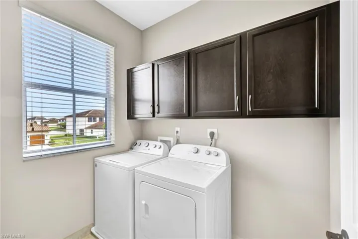 Upstairs laundry room with lots of natural light