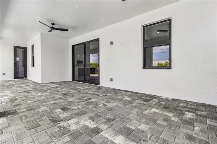 View of patio / terrace featuring a ceiling fan
