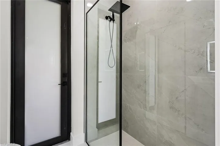 Pool bathroom with tiled shower