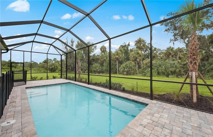 POOL UNDER CONSTRUCTION. Photos are from a completed home of the same model. Options for this home may vary.