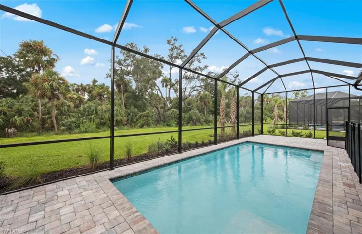 POOL UNDER CONSTRUCTION. Photos are from a completed home of the same model. Options for this home may vary.
