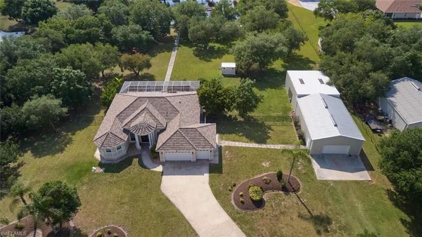 Awesome Alva! Privacy and Space on these 3.38 acres!  Pool home, 2 Section Barn, 2 sheds, walking/jogging path and wait till we get to the Lake!