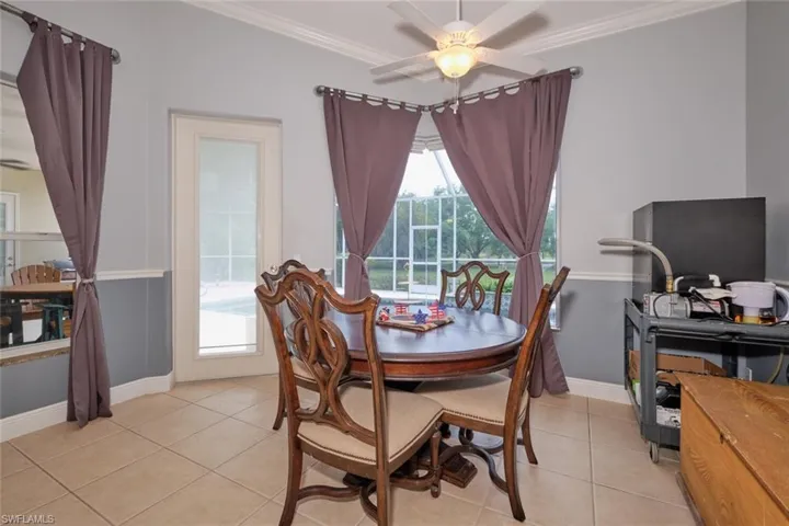 Nice kitchen alcove with a door leading to the pool/lanai area.