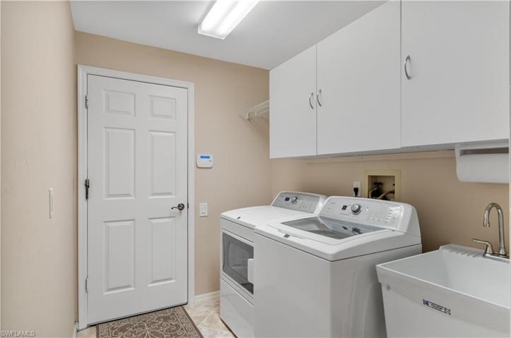 Laundry room with sink