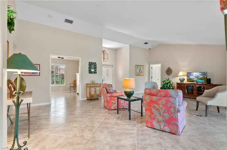 Sitting in dining room looking into family room