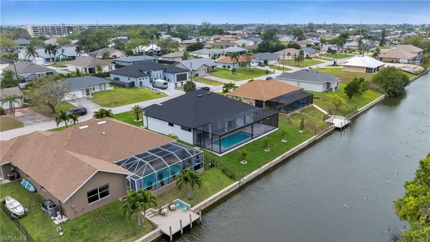 Bird's eye view with a residential view and a water view