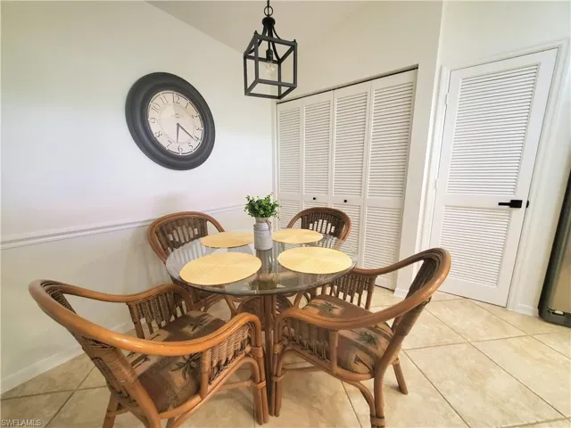 Dining room with light tile floors