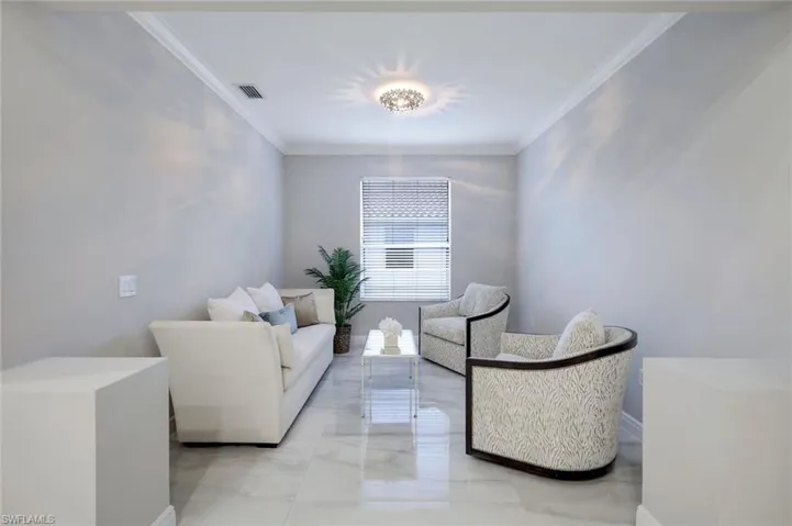 Living area with crown molding