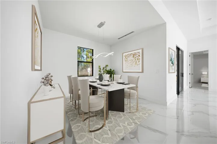 Open-concept dining area featuring tile flooring, a large window, and a contemporary light fixture