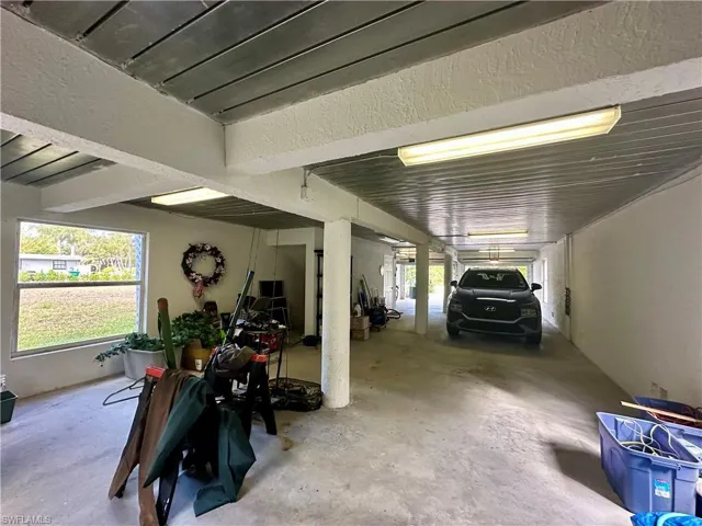 The flex space is not only a buffer from storms but also provides storage, parking, workspace, or any adaptation you desire
