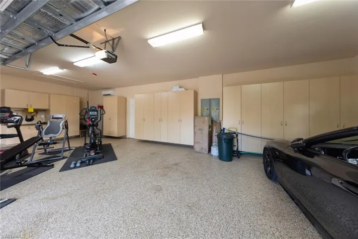 Garage w/Polymer flooring, storage, all by Encore Garage