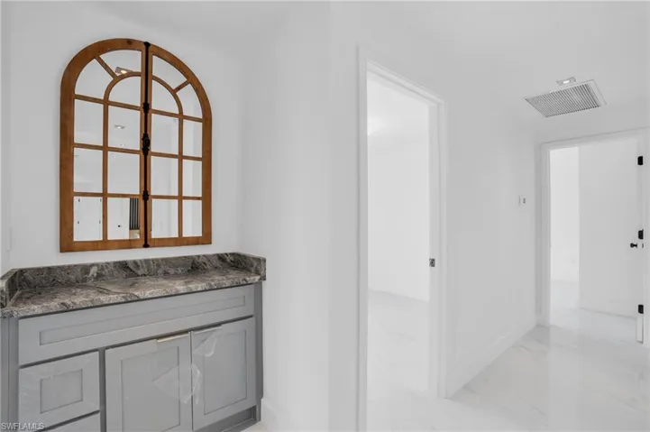 Bathroom with tile floors and large vanity