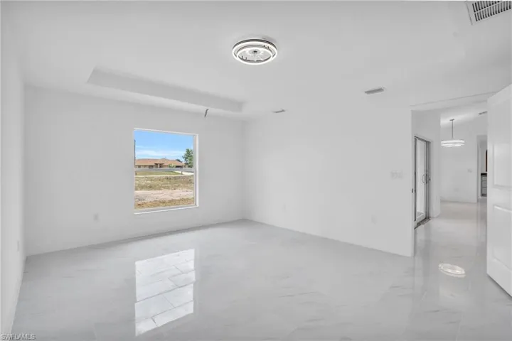 View of tiled spare room